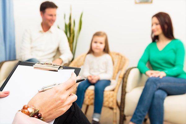 Parents and daughter in therapy