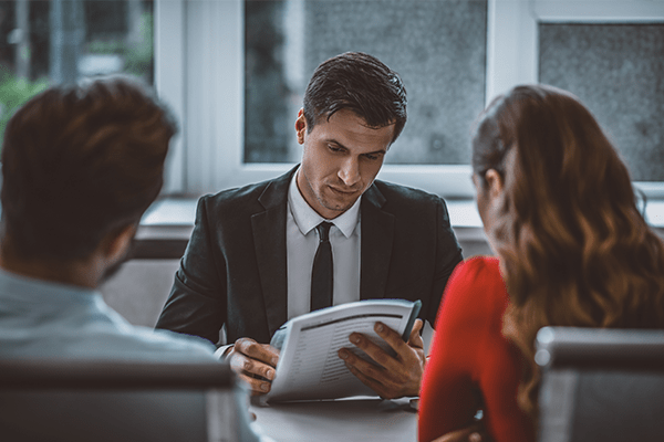 Couple meeting with lawyer