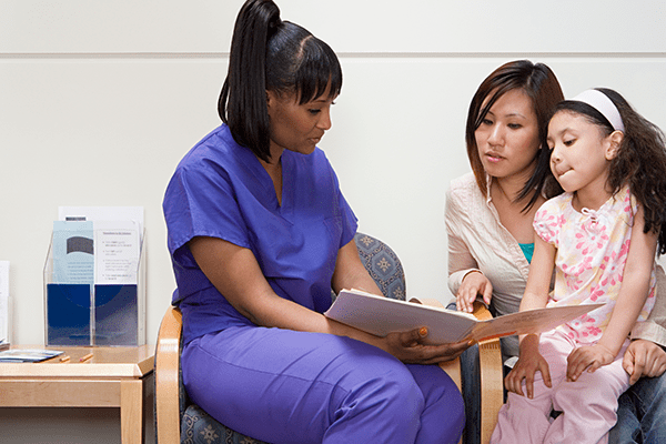 Mother and daughter at pediatrician's office