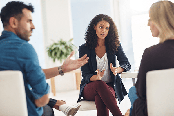 Couple talking to lawyer