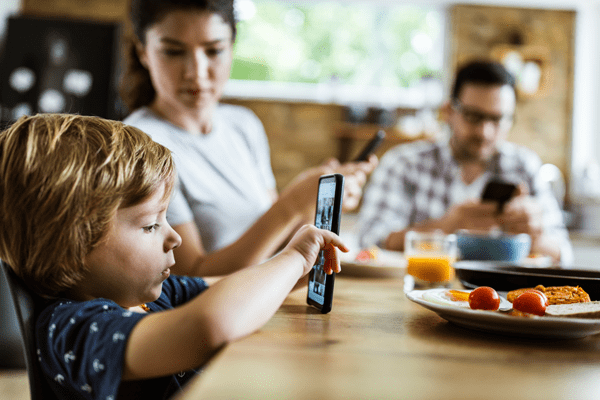 Child playing on phone