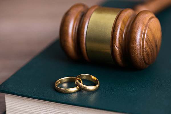 Gavel and wedding bands