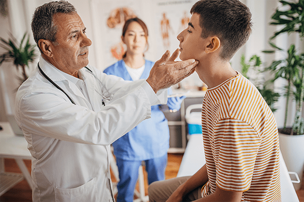 Teenage boy at the doctor