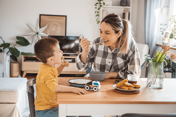 Mother feeding child