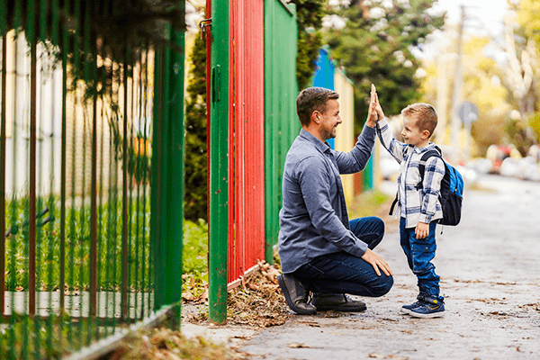 Father sending son to school