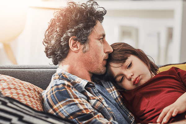 Father consoling daughter