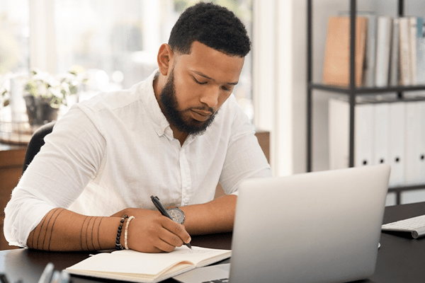 Man taking notes